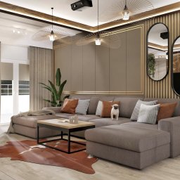 BASSO WNĘTRZA KLAUDIA BERECHOWSKA - Nowoczesny salon z narożną sofą w odcieniach brązu, geometrycznymi lampami wiszącymi i dekoracyjnymi lustrami owalnymi; beżowe zasłony i dywan imitujący skórę krowy.