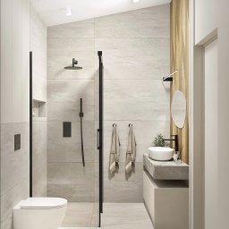 BASSO WNĘTRZA KLAUDIA BERECHOWSKA - Nowoczesna łazienka z kabiną prysznicową typu walk-in z czarnymi profilami, wiszącą toaletą, umywalką nablatową na betonowym blacie i drewnianą ścianą z geometrycznym wzorem.