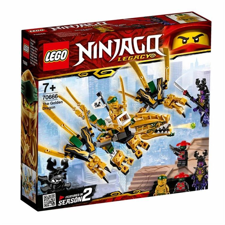 Pudełko zestawu klocków LEGO Ninjago Legacy 70666 przedstawiające złotego smoka z minifigurkami ninja na tle miasta Ninjago.
