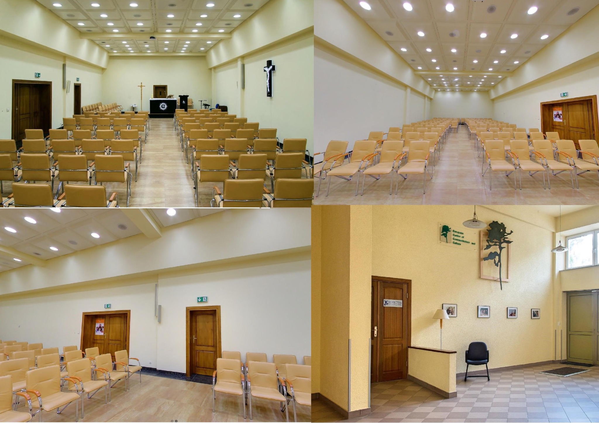 Sala konferencyjna z rzędami krzeseł w odcieniach beżu, oświetlona panelami sufitowymi, z krzyżem na ścianie i podium z logo w tle.