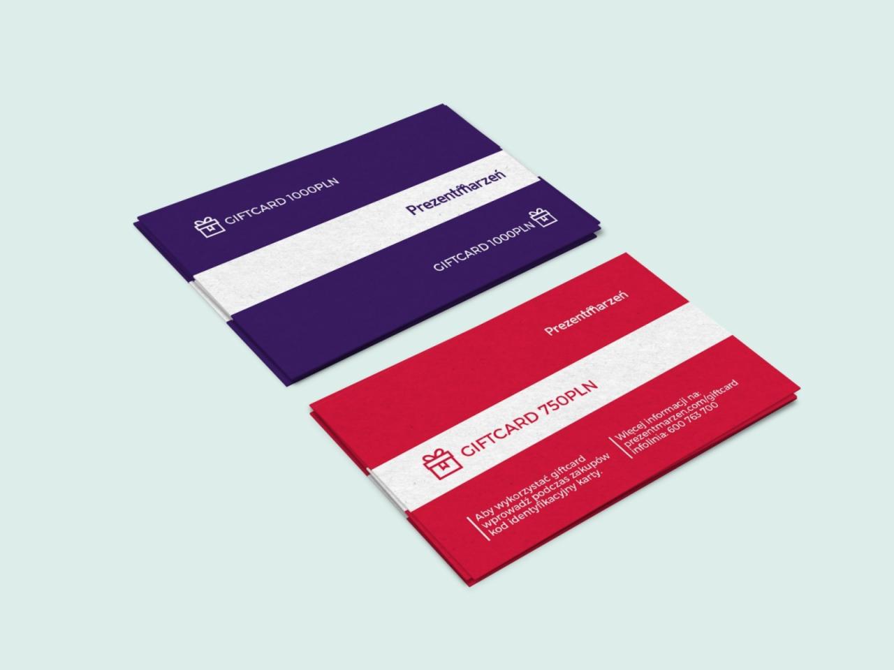 Dwa vouchery prezentowe: fioletowy o wartości 1000 PLN i czerwony o wartości 750 PLN, leżące na jasnym tle.