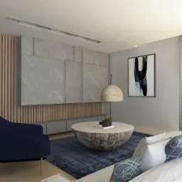 Wizualizacja salonu z okładziną ścienną z lameli i kamienia, okrągłym stolikiem kawowym oraz ciemnoniebieskim fotelem na złotych nóżkach i obrazem na ścianie.