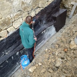 TOMINI Tomasz Smolin - ocieplenie lawicy kamiennej wraz z wzmocnieniem z betonu