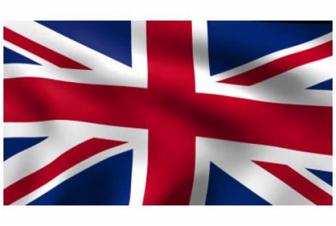 Flaga Wielkiej Brytanii z efektem falowania, wyraźne kolory i cienie.