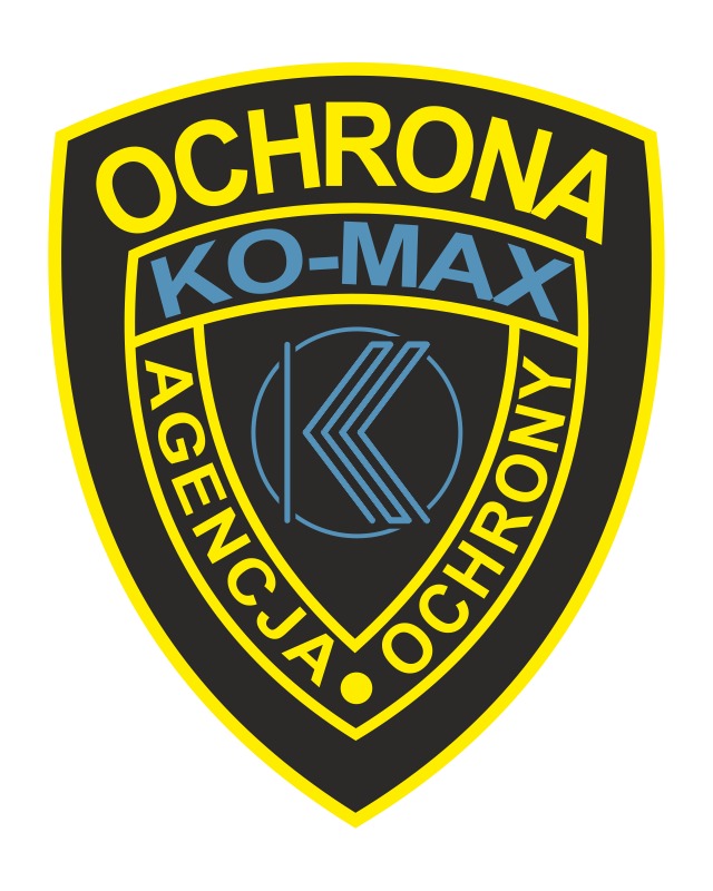 Logo Agencji Ochrony KO-MAX w kształcie tarczy z żółto-czarną obwódką i niebieskim symbolem litery K w okręgu wewnątrz.