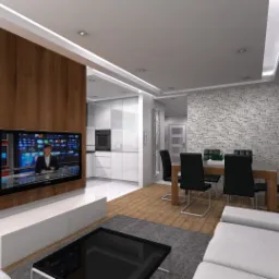 Wizualizacja wnętrza: połączony salon z jadalnią i kuchnią w nowoczesnym stylu. Drewniana ściana z telewizorem, biała szafka RTV, szara sofa, czarny stolik kawowy, stół z krzesłami i biała kuchnia...