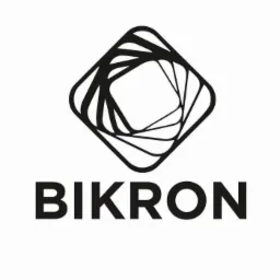 Czarno-białe logo firmy BIKRON z abstrakcyjnym symbolem w kształcie rombu utworzonego z linii.