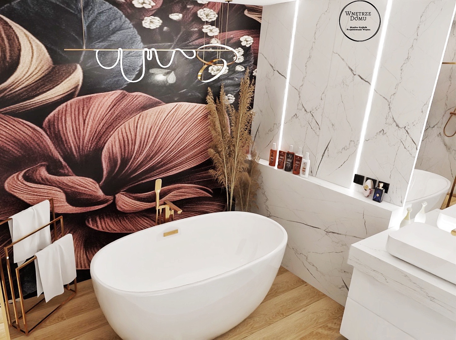Nowoczesna łazienka z wolnostojącą białą wanną, marmurowymi ścianami z podświetleniem LED, tapetą w kwiaty i złotymi akcentami, takimi jak armatura i wieszak na ręczniki.