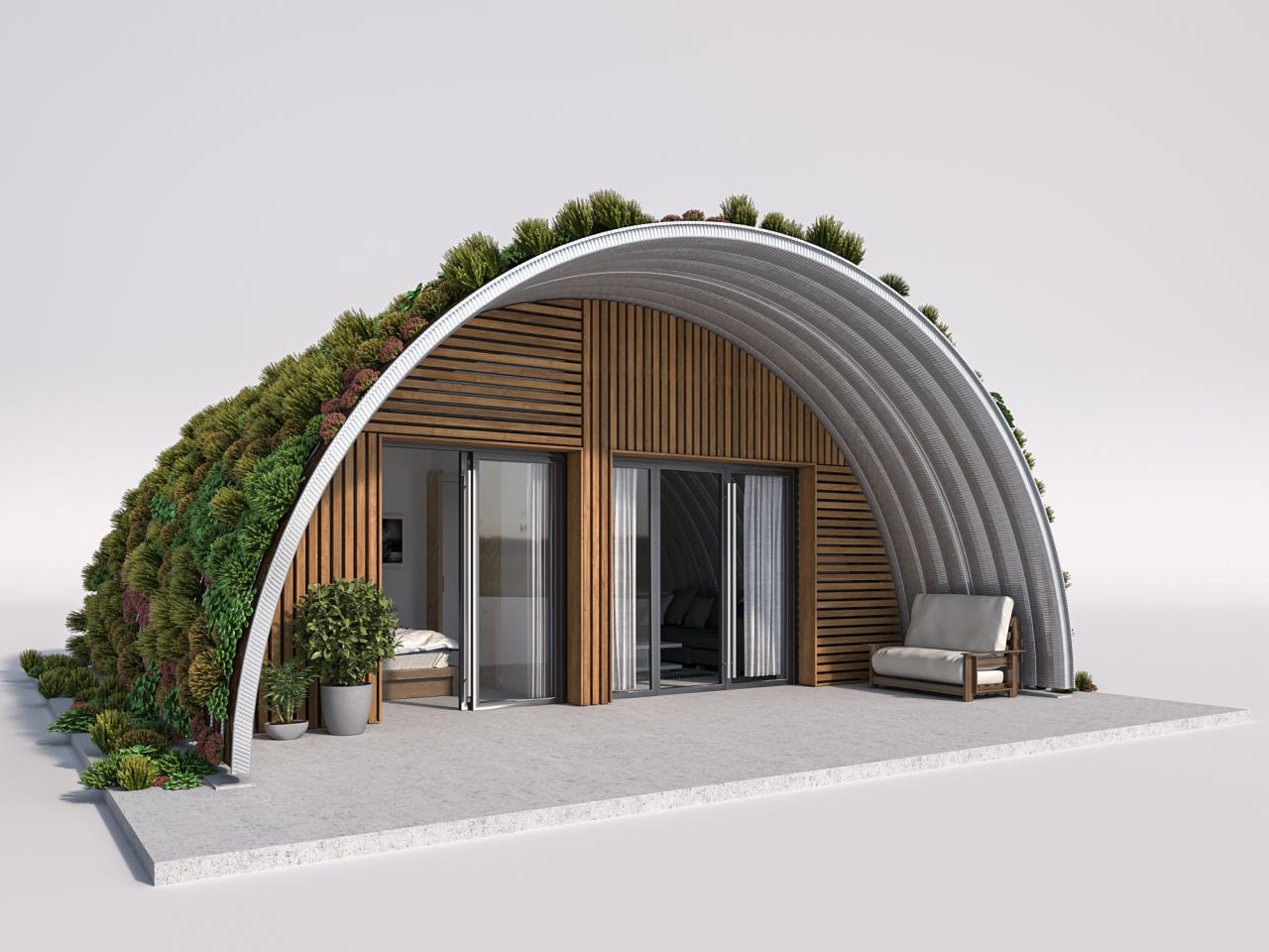 Nowoczesny, łukowy dom z drewnianą fasadą i zielonym dachem, otwarty na zewnątrz przez przesuwne szklane drzwi, z meblami na zewnątrz.