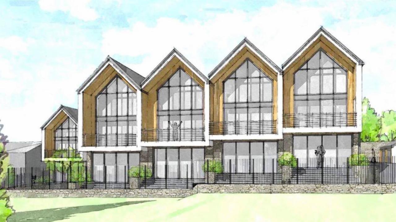 Szkic architektoniczny szeregu nowoczesnych domów z dużymi przeszkleniami i balkonami w Białymstoku, prezentujący koncepcję zabudowy.