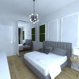 FERENC STUDIO indywidualne projektowanie wnętrz - Wizualizacja sypialni z szarą tapicerowaną ramą łóżka, białymi ścianami z zielonymi panelami, nowoczesną lampą wiszącą i lustrem odbijającym dodatkowe łóżko.