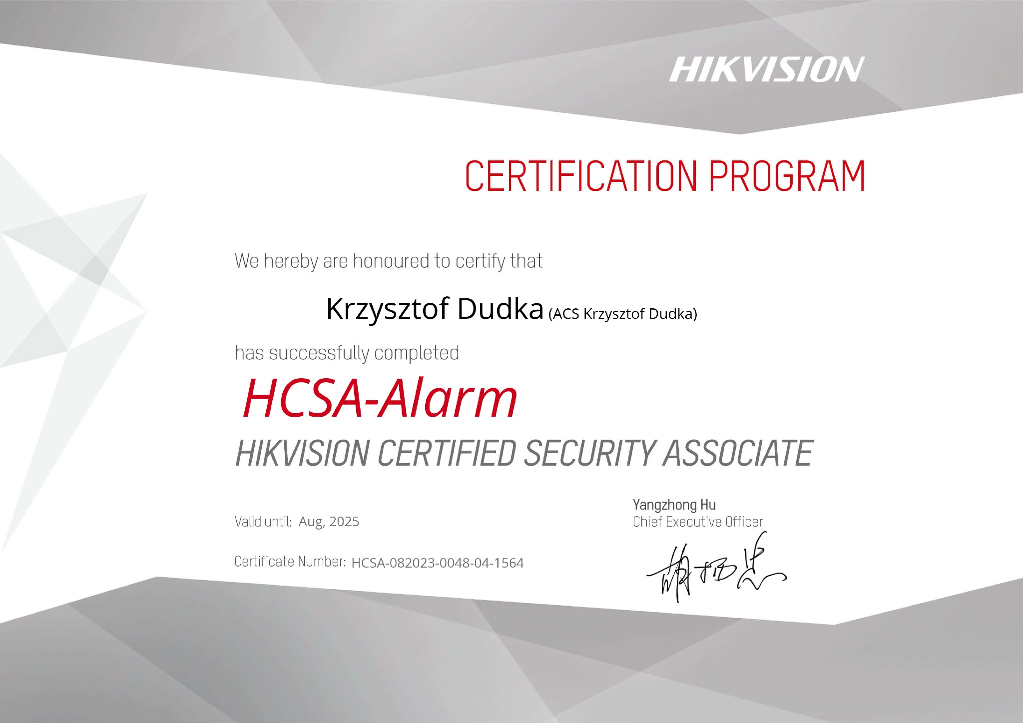 Certyfikat HCSA-Alarm dla Krzysztofa Dudki, HIKVISION CERTIFIED SECURITY ASSOCIATE, ważny do sierpnia 2025, z podpisem Yangzhong Hu, Chief Executive Officer.
