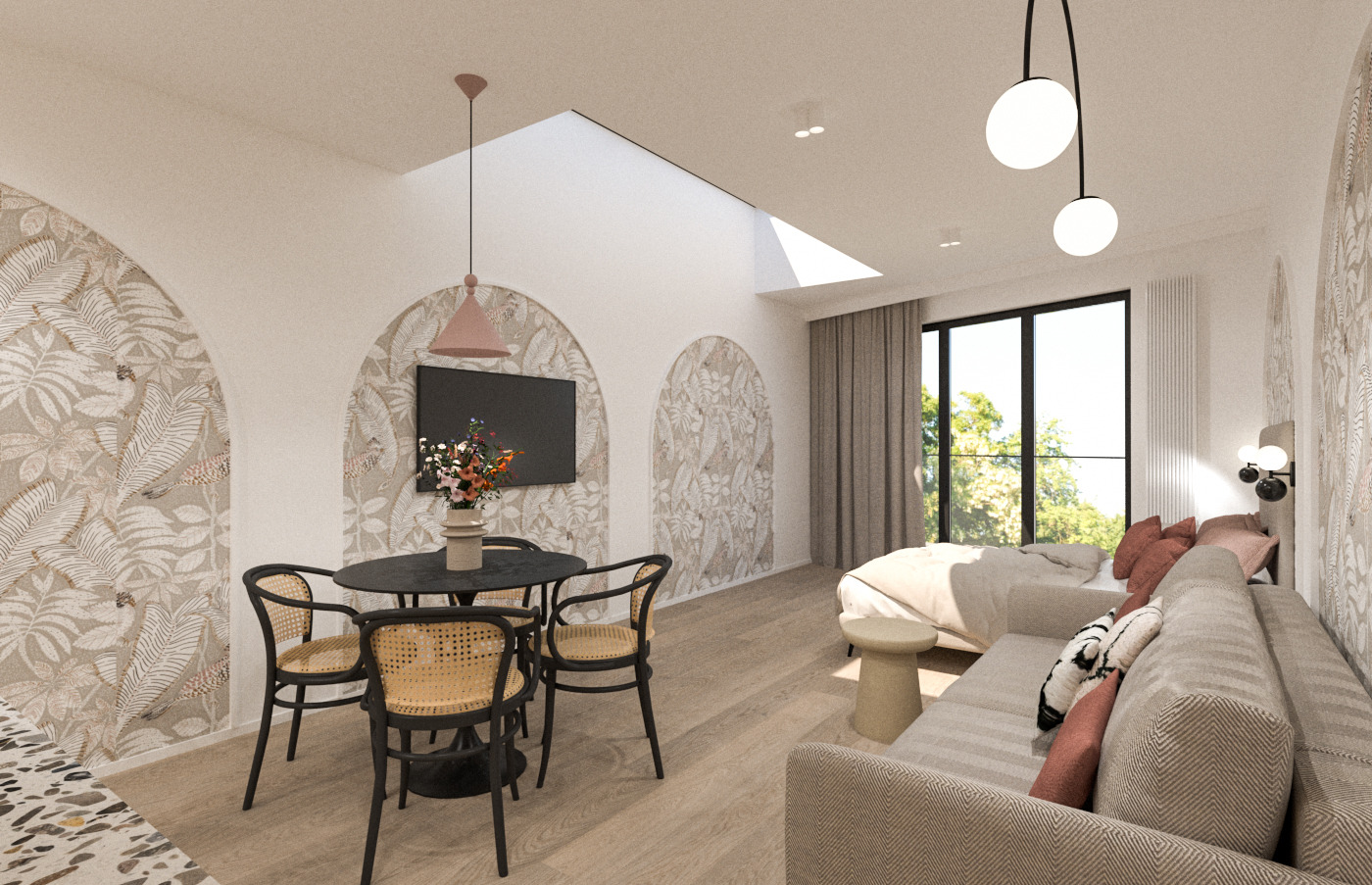 Wnętrze mieszkania z jadalnią i częścią wypoczynkową, ściany zdobione tapetą w motywy roślinne, okrągły stół z czarnym blatem i rattanowymi krzesłami, sofa z poduszkami w odcieniach beżu i różu...