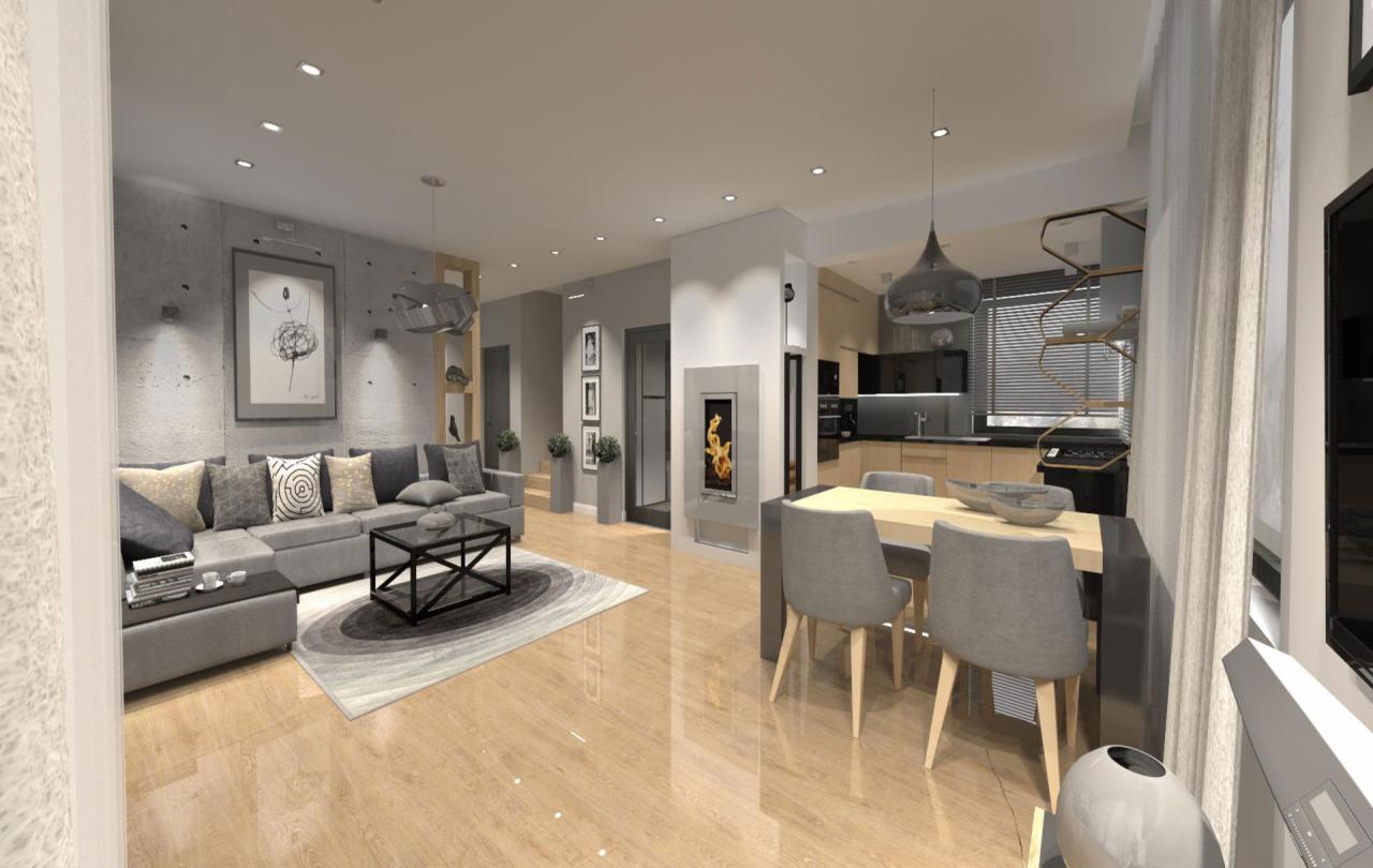 Wizualizacja przestronnego wnętrza mieszkania z betonową ścianą, szarą sofą narożną, czarnym stolikiem kawowym na okrągłym dywanie, biokominkiem, oraz jadalnią z drewnianym stołem i szarymi...