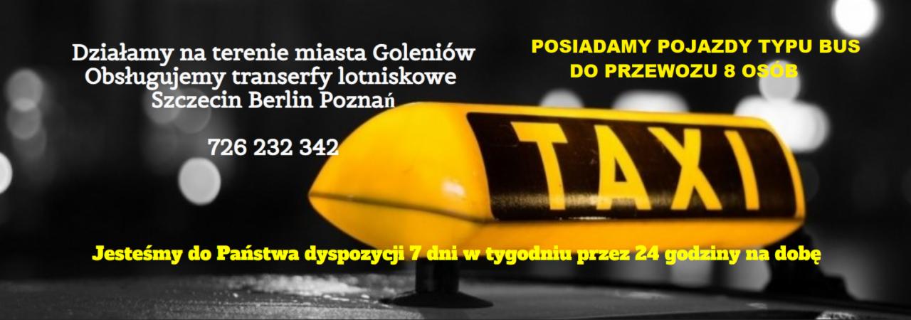 Żółty szyld taksówkowy z napisem 'TAXI' na czarno-białym tle z informacjami o transferach lotniskowych w Goleniowie, Szczecinie, Berlinie i Poznaniu oraz numerem telefonu, oferujący usługi 7 dni...