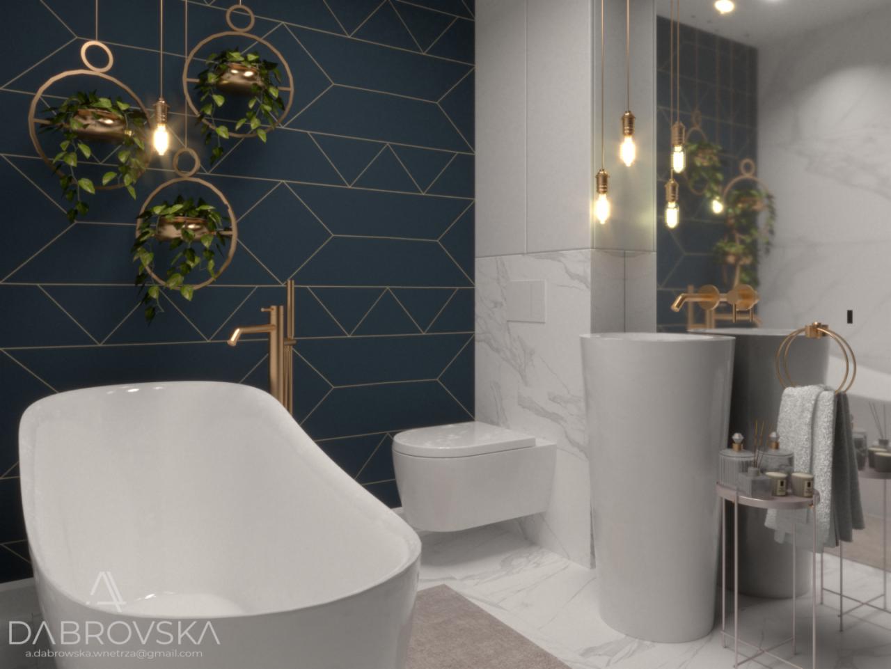 Elegancka łazienka z wolnostojącą wanną, umywalką na postumencie i złotymi akcentami, w tym armatura i wiszące kwietniki, na tle granatowej ściany z geometrycznym wzorem.