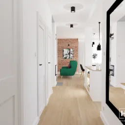 Wizualizacja wnętrza mieszkania: długi korytarz z białymi drzwiami i drewnianą podłogą prowadzi do salonu z ceglaną ścianą, zielonym fotelem i czarnymi lampami sufitowymi. W korytarzu duże lustro...