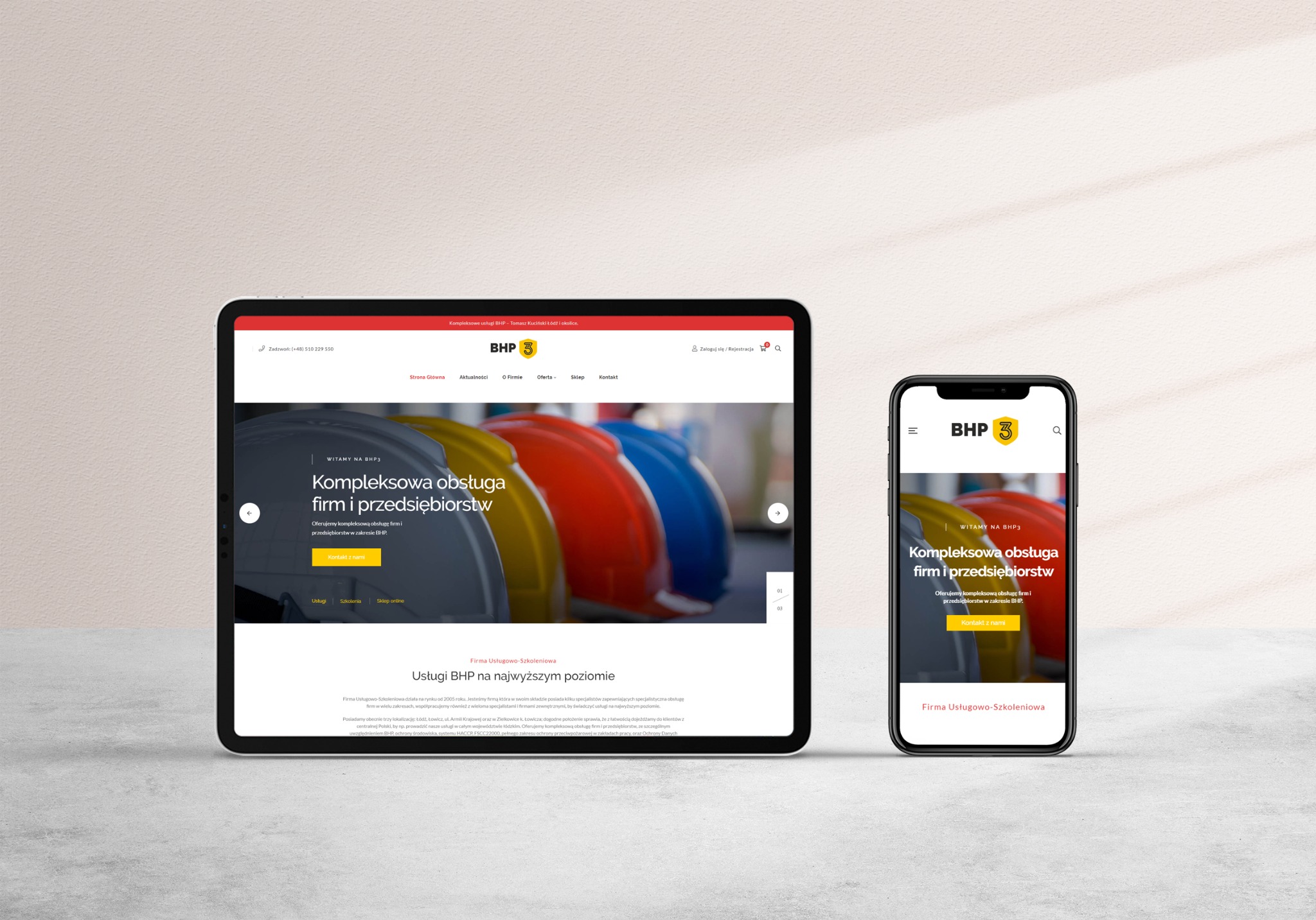 Responsywna strona internetowa BHP3 na tablecie i smartfonie, prezentująca kompleksową obsługę firm i przedsiębiorstw, z widocznymi kaskami w tle.
