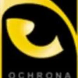 Żółto-czarne logo firmy Ochrona Dogmat z symbolem oka w górnej części, umieszczone na białym tle. Dolna część logo zawiera nazwę firmy.