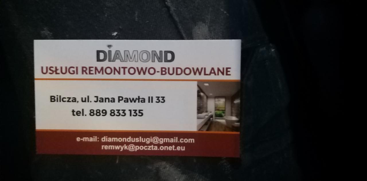 Wizytówka firmy remontowo-budowlanej Diamond z adresem Bilcza, ul. Jana Pawła II 33, numerem telefonu 889 833 135 i adresem e-mail na ciemnym tle.