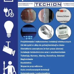 Plakat reklamowy firmy Techion z ofertą projektowania i wykonawstwa instalacji, w tym elektrycznych, teletechnicznych, alarmowych, domofonowych, oraz oświetlenia zewnętrznego. Na plakacie widoczne...