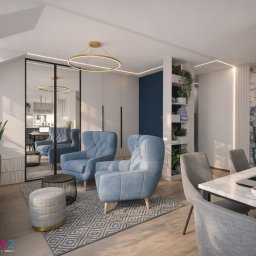 Studio Metr Na 2 - Projektowanie Wnętrz i Mebli - Stylowe wnętrze mieszkania z niebieskimi fotelami, marmurowym stołem i dekoracyjnym oświetleniem LED. Widoczne lustro powiększa przestrzeń. Projekt Metrna2.
