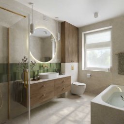 Studio Metr Na 2 - Projektowanie Wnętrz i Mebli - Nowoczesna łazienka z drewnianą szafką pod umywalką, okrągłym lustrem z podświetleniem LED i zielonymi akcentami w postaci płytek i roślin.