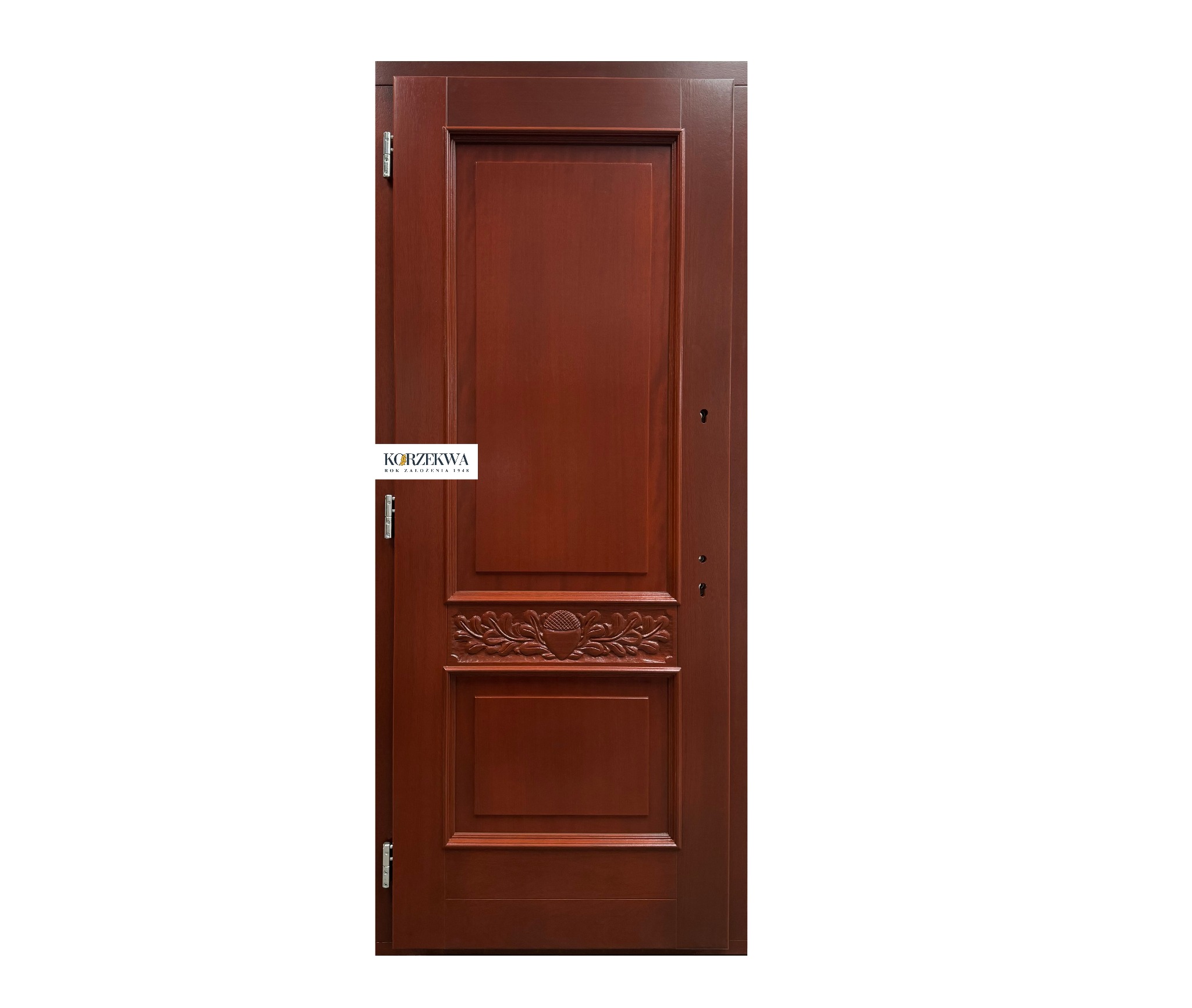 Ciemnobrązowe skrzydło drzwiowe z dekoracyjnym motywem żołędzia i liści dębu, widoczne zawiasy i logo producenta.