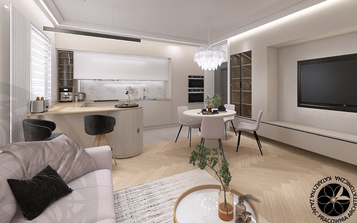 Jasne wnętrze: salon z aneksem kuchennym i jadalnią. Parkiet w jodełkę, pastelowe meble, minimalistyczne oświetlenie. Widoczny fragment sofy i stolika kawowego.