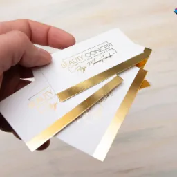 Wizytówki ze złotym logo