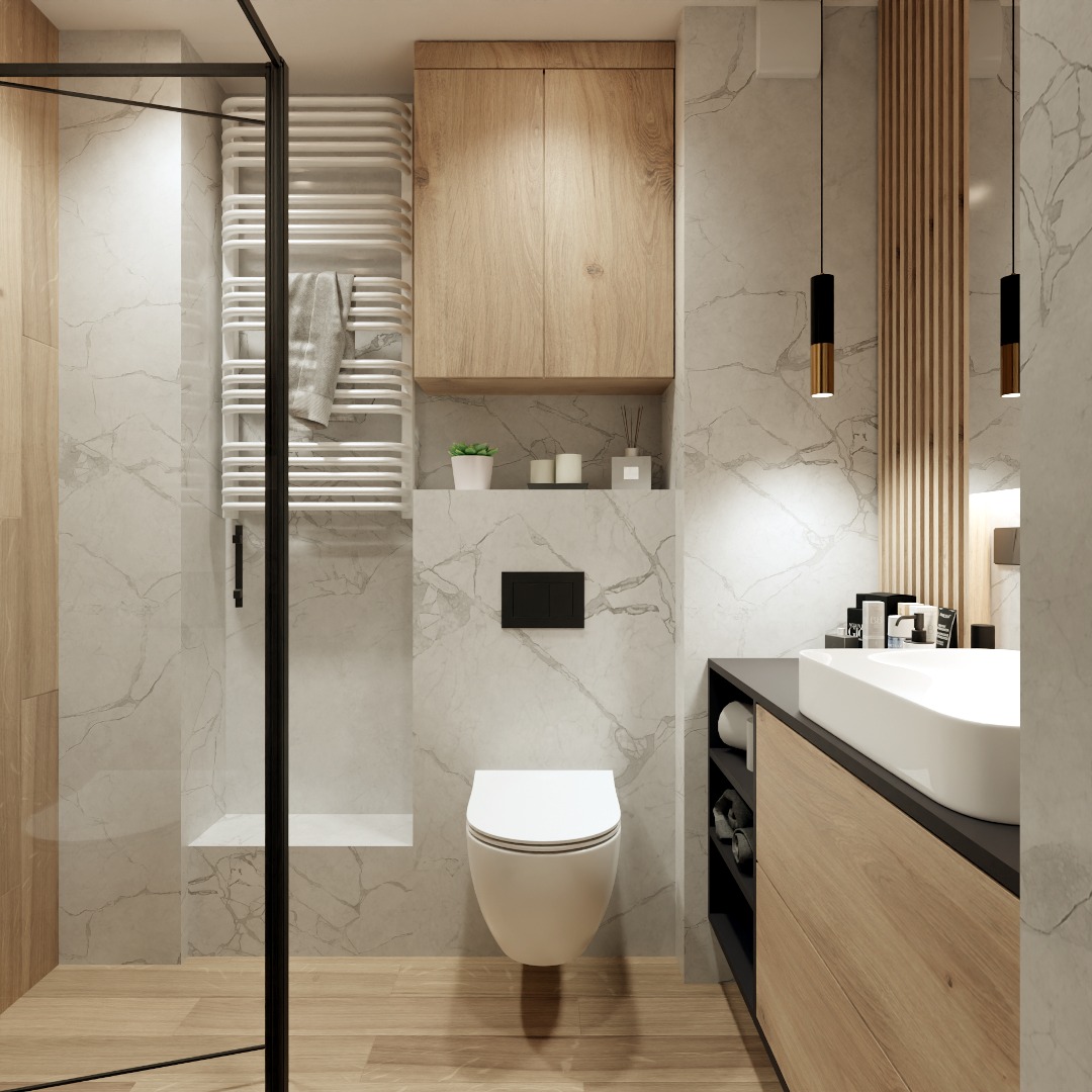 Nowoczesna łazienka z marmurowymi płytkami, drewnianymi szafkami i czarnymi akcentami. Kabina prysznicowa ze szklaną ścianką, wisząca toaleta i designerskie oświetlenie.