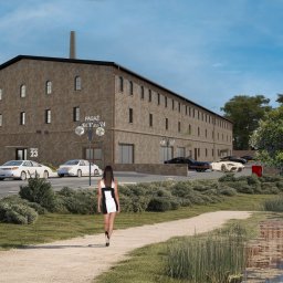 PRO-ART PROJECT   SPÓŁKA Z OGRANICZONĄ ODPOWIEDZIALNOŚCIĄ - Wizualizacja budynku usługowego z cegły z napisem 'Pasaż Eculenia', otoczonego zielenią, z chodnikiem i jeziorkiem w kadrze. Widoczna kobieta idąca w stronę budynku.