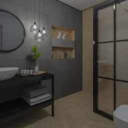 Nowoczesna łazienka z szarymi płytkami, drewnianą podłogą w jodełkę i kabiną prysznicową w czarnej ramie. Okrągłe lustro nad białą umywalką na czarnym blacie, podwieszane lampy kuliste...