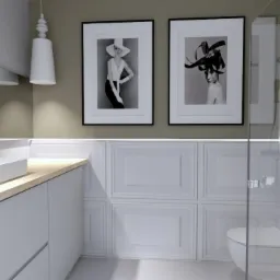 Nowoczesna łazienka z białymi szafkami pod umywalką z drewnianym blatem, kabiną prysznicową i czarno-białymi portretami w ramkach na ścianie.