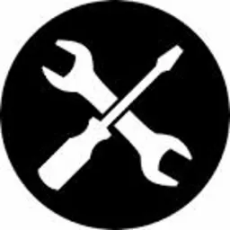 Ikona serwisu w Dwikozach: skrzyżowany klucz płaski i śrubokręt na czarnym tle w okręgu. Symbol napraw i usług technicznych.