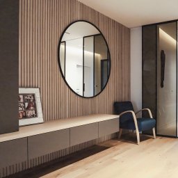 Wyskkuchnie - Nowoczesny przedpokój z szafką RTV, okrągłym lustrem i fototapetą z pionowymi lamelami. Na szafce ramka ze zdjęciami. Minimalistyczny design.