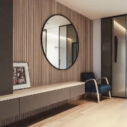 Nowoczesny przedpokój z szafką RTV, okrągłym lustrem i fototapetą z pionowymi lamelami. Na szafce ramka ze zdjęciami. Minimalistyczny design.