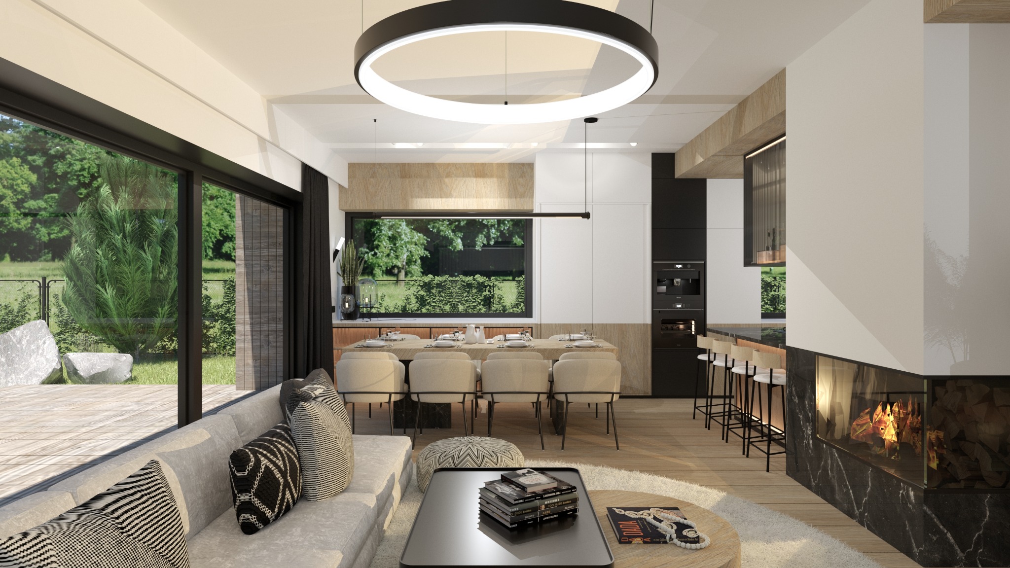 Nowoczesne wnętrze domu z otwartą przestrzenią: salon z sofą i wzorzystymi poduszkami, jadalnia z długim stołem i krzesłami, kuchnia z czarnymi szafkami oraz kominek obłożony marmurem, oświetlone...