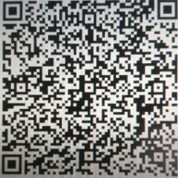 Czarno-biały kod QR z widocznymi kwadratami i wzorami, potencjalnie zawierający dane kontaktowe lub link do strony internetowej firmy.