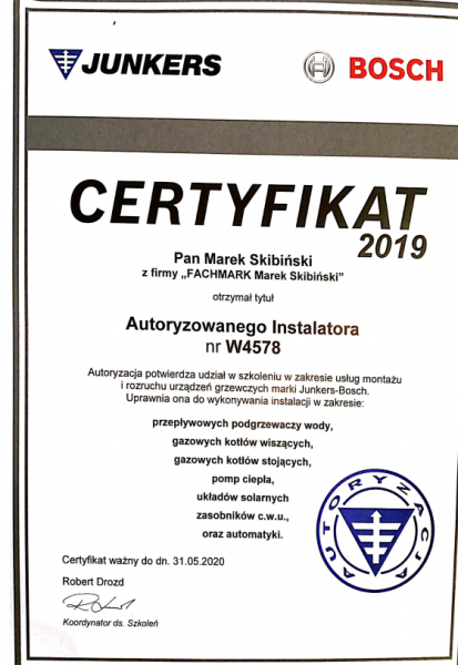 Skan certyfikatu autoryzacji dla instalatora marki Junkers-Bosch, wydany w 2019 roku dla Pana Marka Skibińskiego z firmy FACHMARK, potwierdzający uprawnienia do instalacji przepływowych...