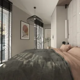 Nowoczesna sypialnia z łóżkiem, zasłoniętymi żaluzjami oknami, lampą wiszącą w stylu industrialnym i minimalistycznymi grafikami na ścianie. Stonowana kolorystyka.