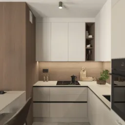 Nowoczesna kuchnia w neutralnych barwach: białe szafki, drewniane akcenty i minimalistyczny design. Na blacie płyta grzewcza, ekspres do kawy i dekoracje.