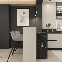 Studio Dobre Miejsce Sylwia Malewicz - Nowoczesna kuchnia w odcieniach szarości i bieli z marmurowym blatem, oświetleniem punktowym i minimalistyczną grafiką na ścianie. Krzesła barowe z tapicerką.