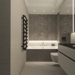 Studio Dobre Miejsce Sylwia Malewicz - Elegancka łazienka w szarościach z akcentami złota: bateria umywalkowa, oświetlenie LED. Grzejnik drabinkowy w czerni, wzorzysta tapeta i minimalistyczna armatura.