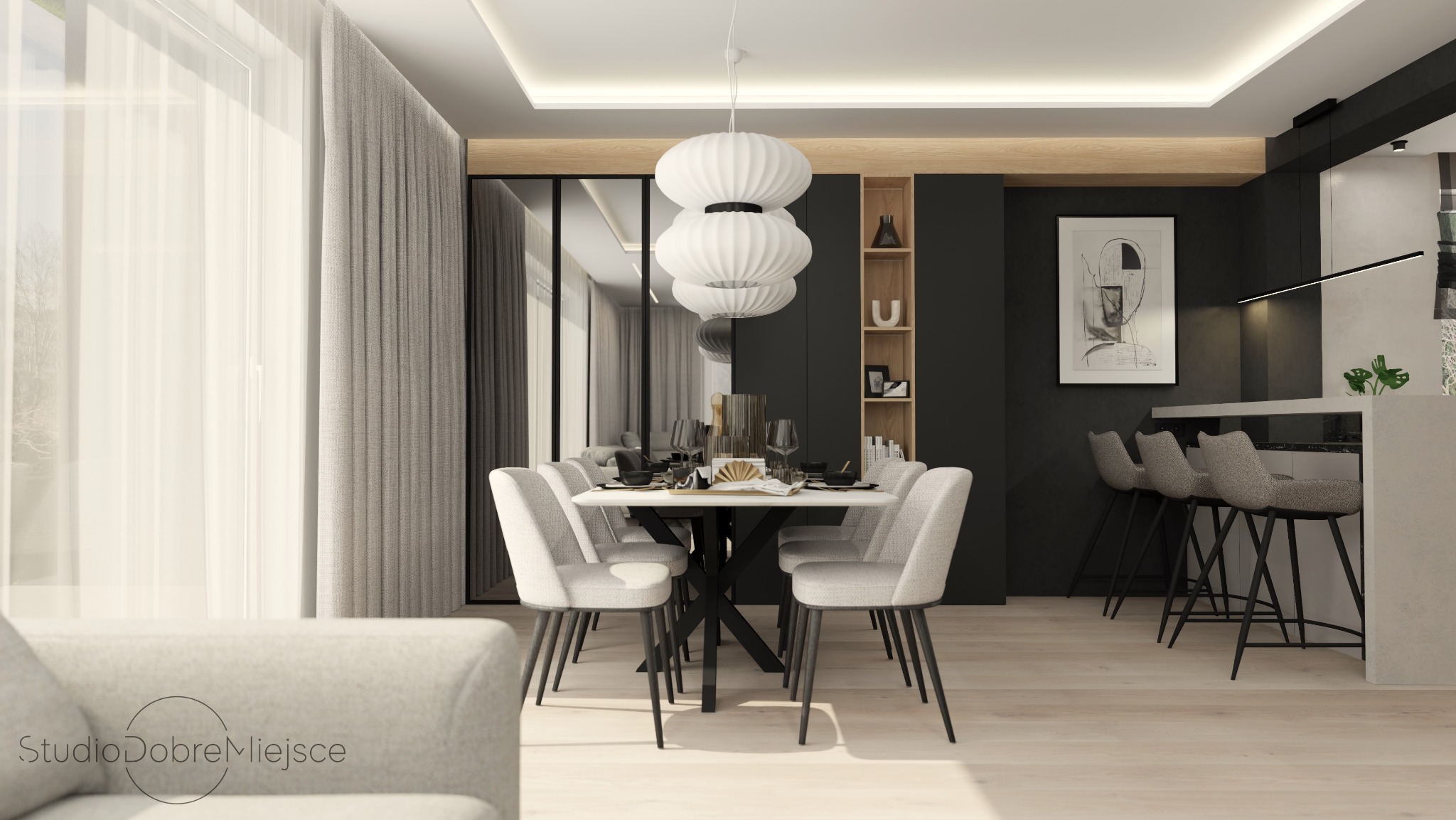 Stylowa jadalnia z białym stołem i krzesłami, oświetlona wiszącą lampą. Czarne ściany i drewniane akcenty tworzą nowoczesny, elegancki wygląd.