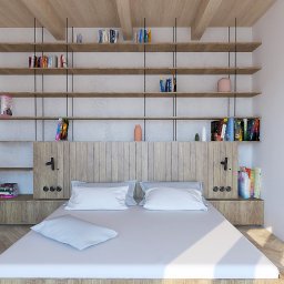 Moduu Magdalena Rosowska - Nowoczesna sypialnia z drewnianym zagłówkiem, półkami na książki zawieszonymi na czarnych prętach i parkietem w jodełkę. Minimalistyczny design z rośliną doniczkową.