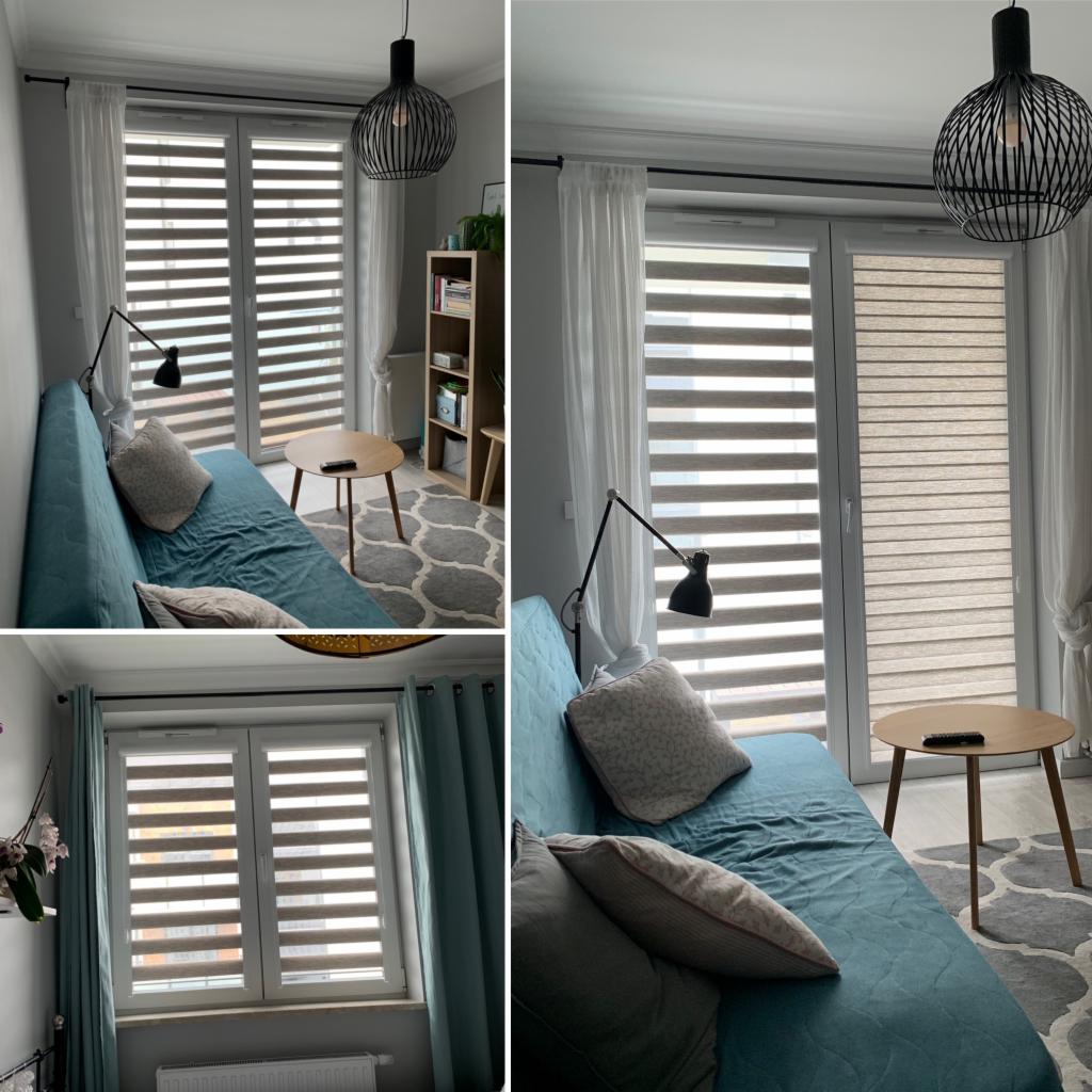 Jasne wnętrze z oknami przesłoniętymi roletami typu dzień i noc, widok na salon z turkusową sofą i okrągłym stolikiem kawowym.