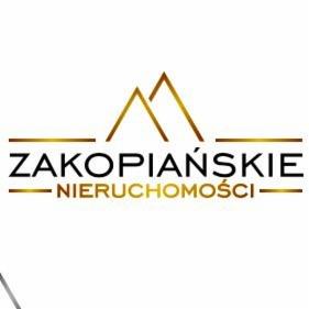 Eleganckie logo 'Zakopiańskie Nieruchomości' w kolorze złotym, z motywem górskim. Minimalistyczny design na białym tle, podkreślający prestiż i lokalizację firmy.