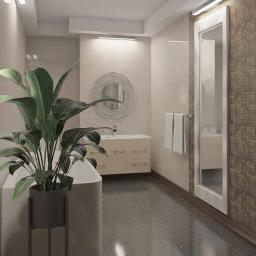 StoWnetrz - Nowoczesna łazienka z wanną, umywalką z szafką, pralką i rośliną doniczkową, wykończona w beżowych i brązowych odcieniach płytek, oświetlona światłem LED.