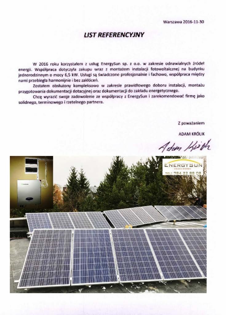 Skan listu referencyjnego dla firmy EnergySun z widocznymi panelami fotowoltaicznymi na dachu budynku i inwerterem na ścianie.